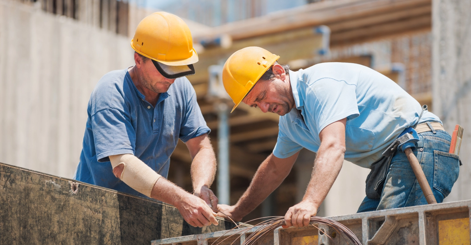 Workplace safety manager with an oral fluid drug test kit at a construction site